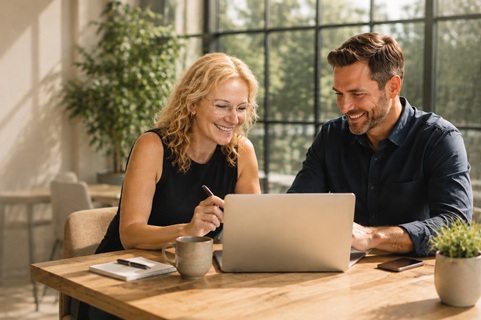 Business owners reviewing their website together